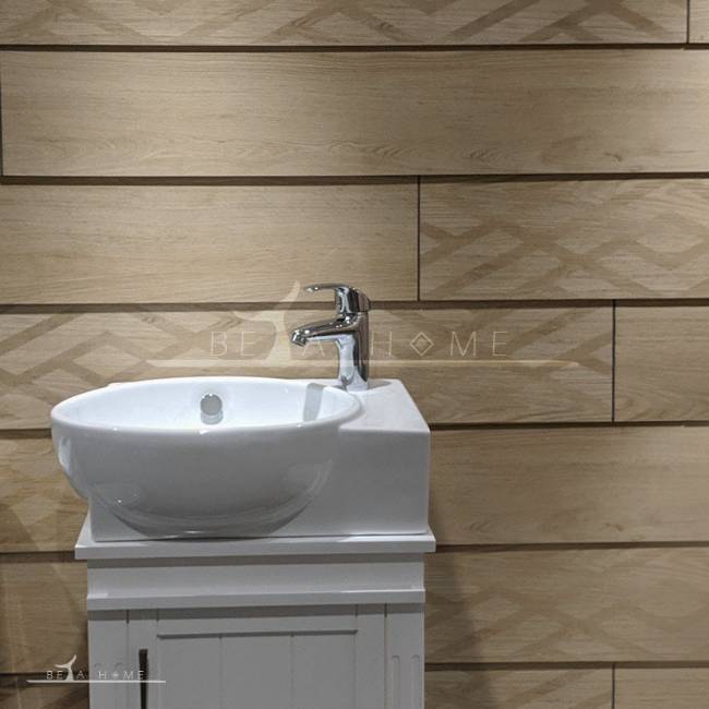 Timber beige decorative and plain wood effect tiles laid in a clapboard pattern