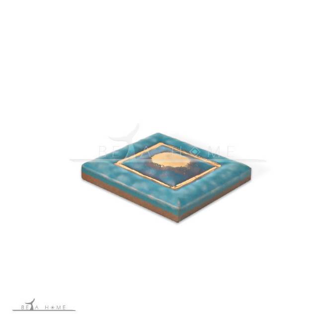 turquoise and gold tile