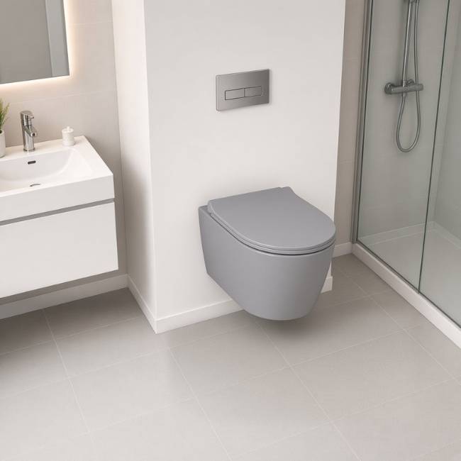 Gray Despina wall-mount toilet in a modern bathroom, raised view